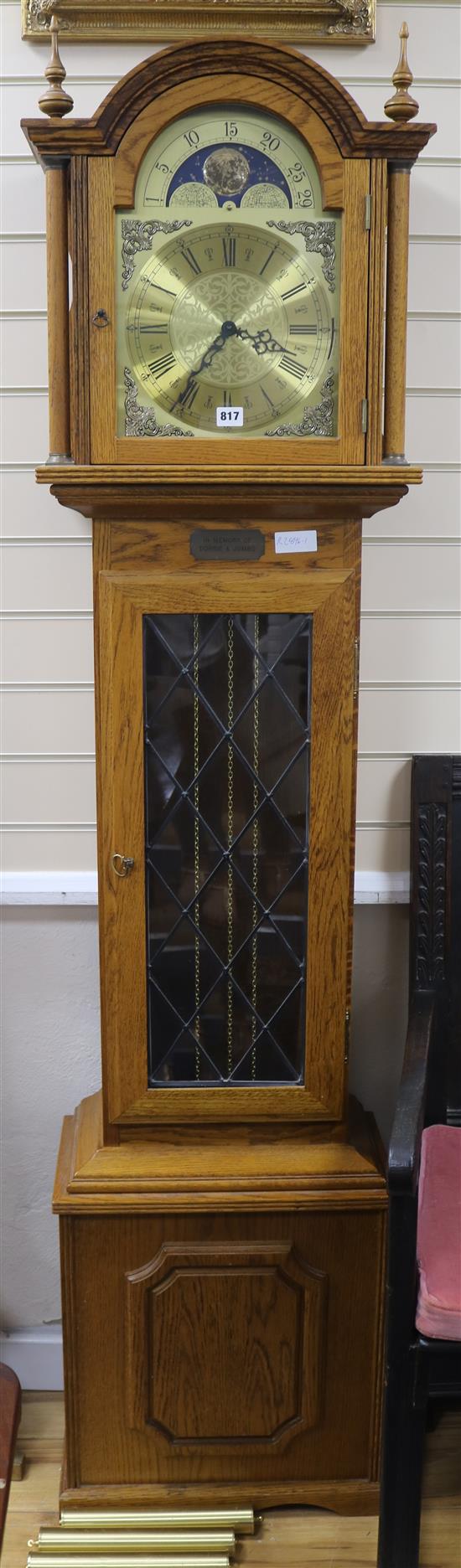 A modern oak cased eight day longcase clock